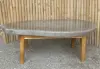 Product image 1 of the product “table made of riverstone with wooden feet. size approx. 118x70x39 cm ”